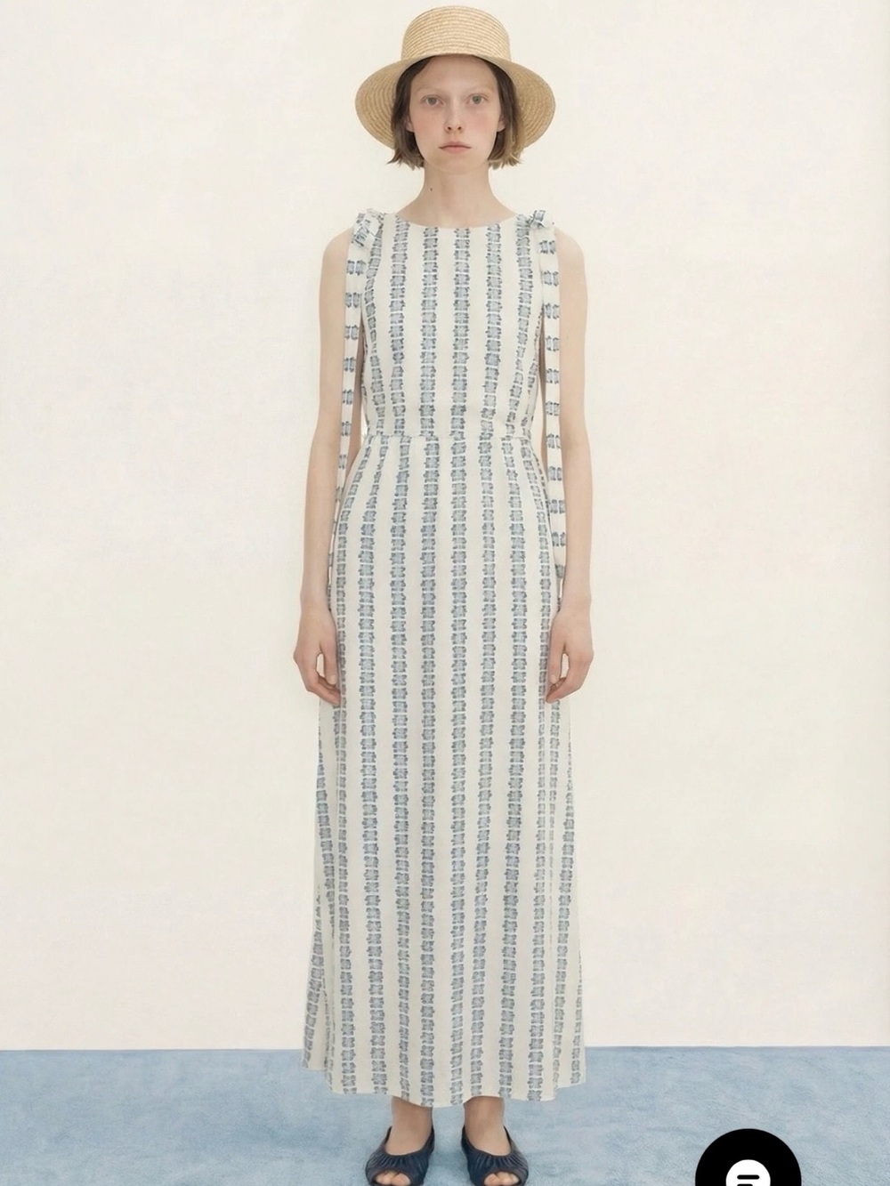 Sleeveless White Maxi Dress with Blue Stripe Detail
